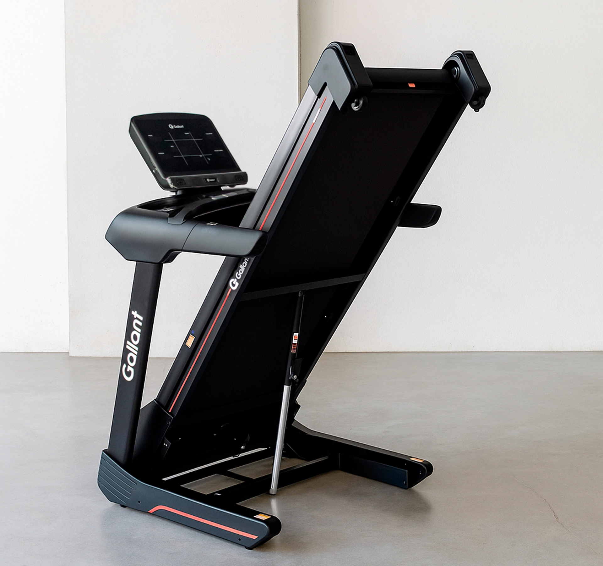 Mulher de camiseta rosa usando a Bicicleta Spinning Magnética Gallant Elite X