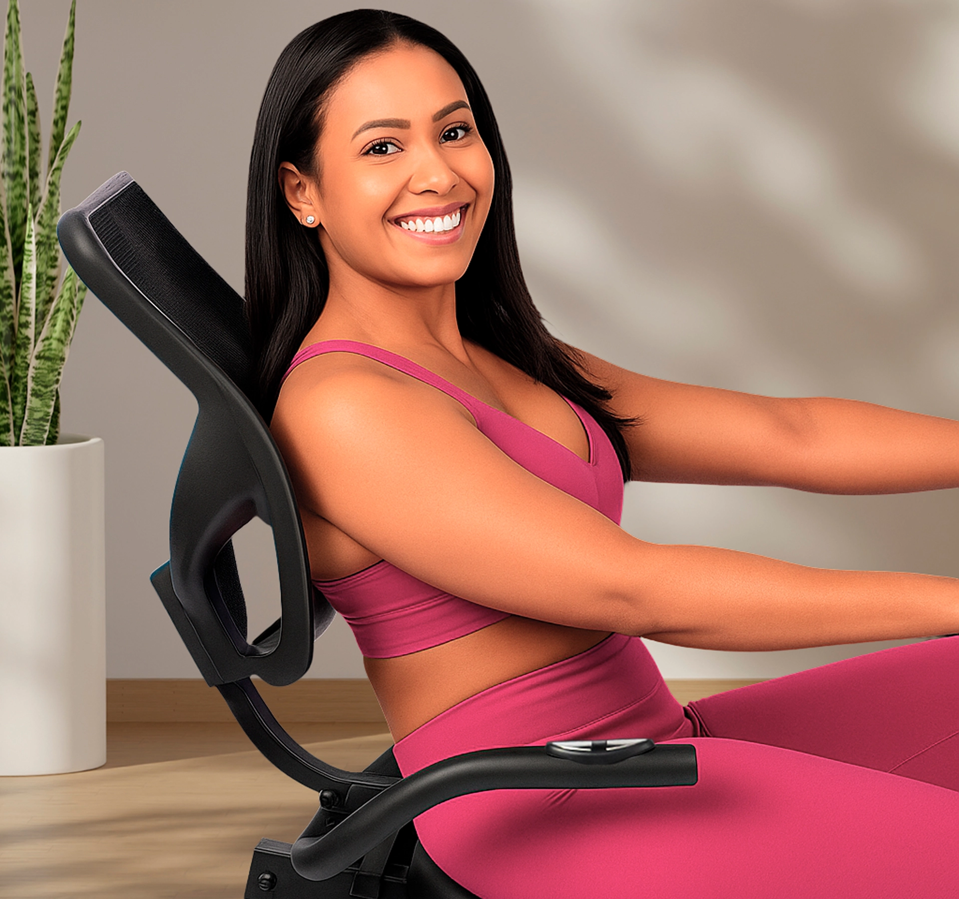 Mulher sentada na Bicicleta Ergométrica Magnética